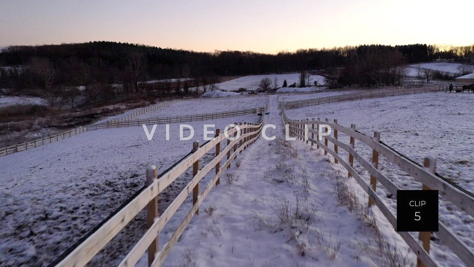 CLIP 5 - Horse farm fence during Winter with snow in pastures