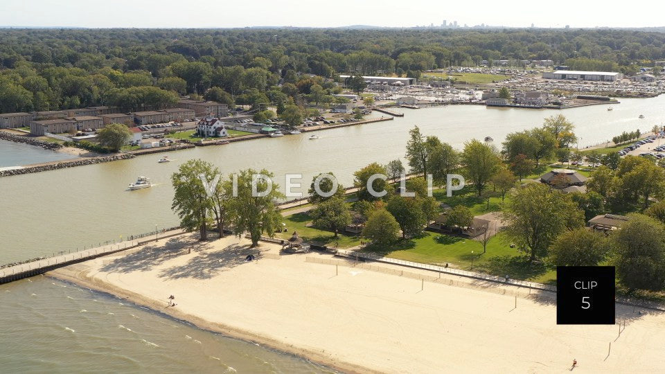 CLIP 5 - Boats leaving Genesee river for Lake Ontario at Ontario Beach Park Rochester, NY