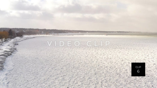 CLIP 6 - Winter Lake Ontario flying over pancake ice to lighthouse