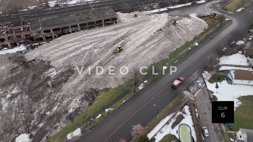 CLIP 6 - Buffalo, NY construction machinery piles up snow after extreme winter weather