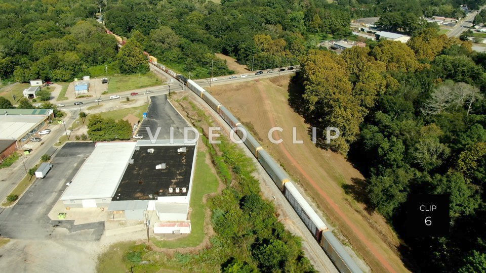 CLIP 6 - Montezuma, GA aerial of train traveling through town