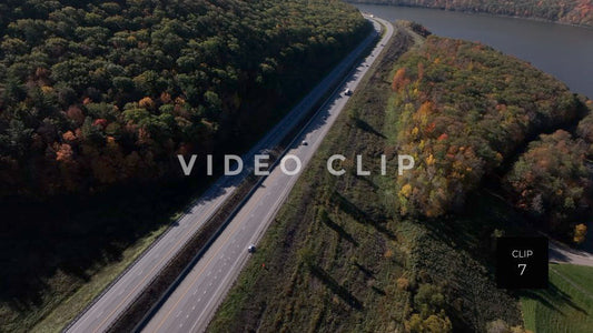 CLIP 7 - Tioga Dam and Reservoir, PA following cars on highway around mountainside