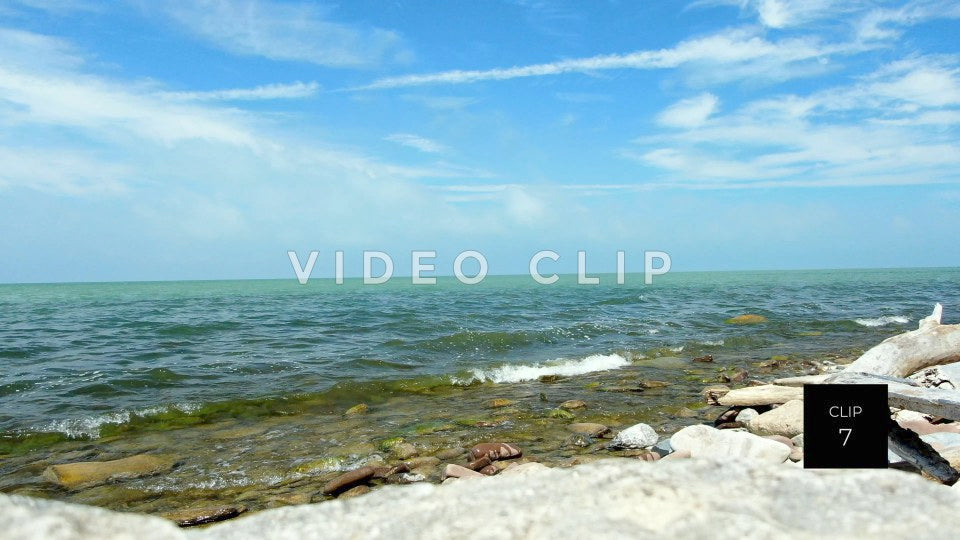 CLIP 7 - Lake Ontario Webster, NY gentle waves break along shoreline