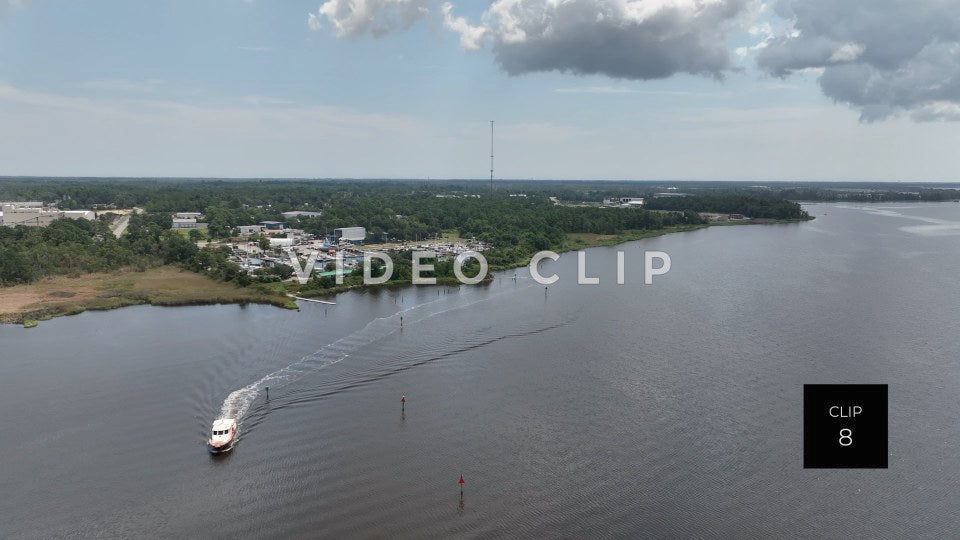 CLIP 8 - Wilmington, NC landscape with boat leaving marina on Cape Fear River