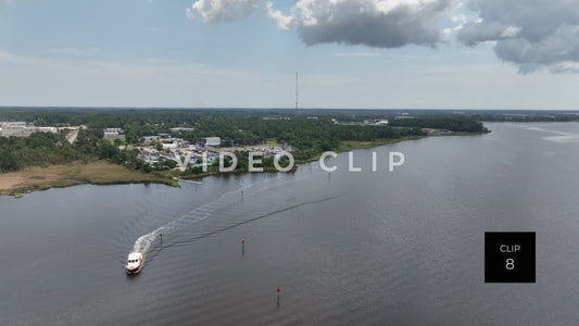 CLIP 8 - Wilmington, NC landscape with boat leaving marina on Cape Fear River