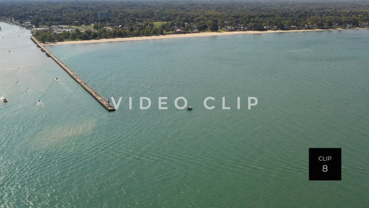 CLIP 8 - Aerial view over Lake Ontario of Ontario Beach Park and Charlotte Pier Rochester, NY