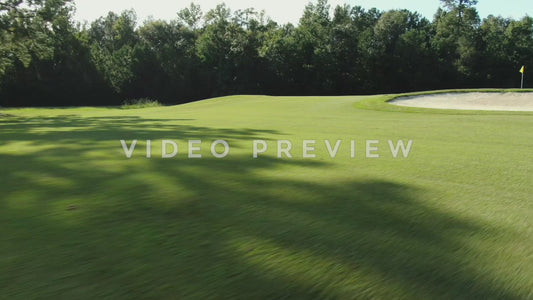 Video - Golf course low flight over sand trap and green