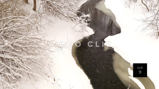 CLIP 9 - Winter snow beside beautiful creek with ice