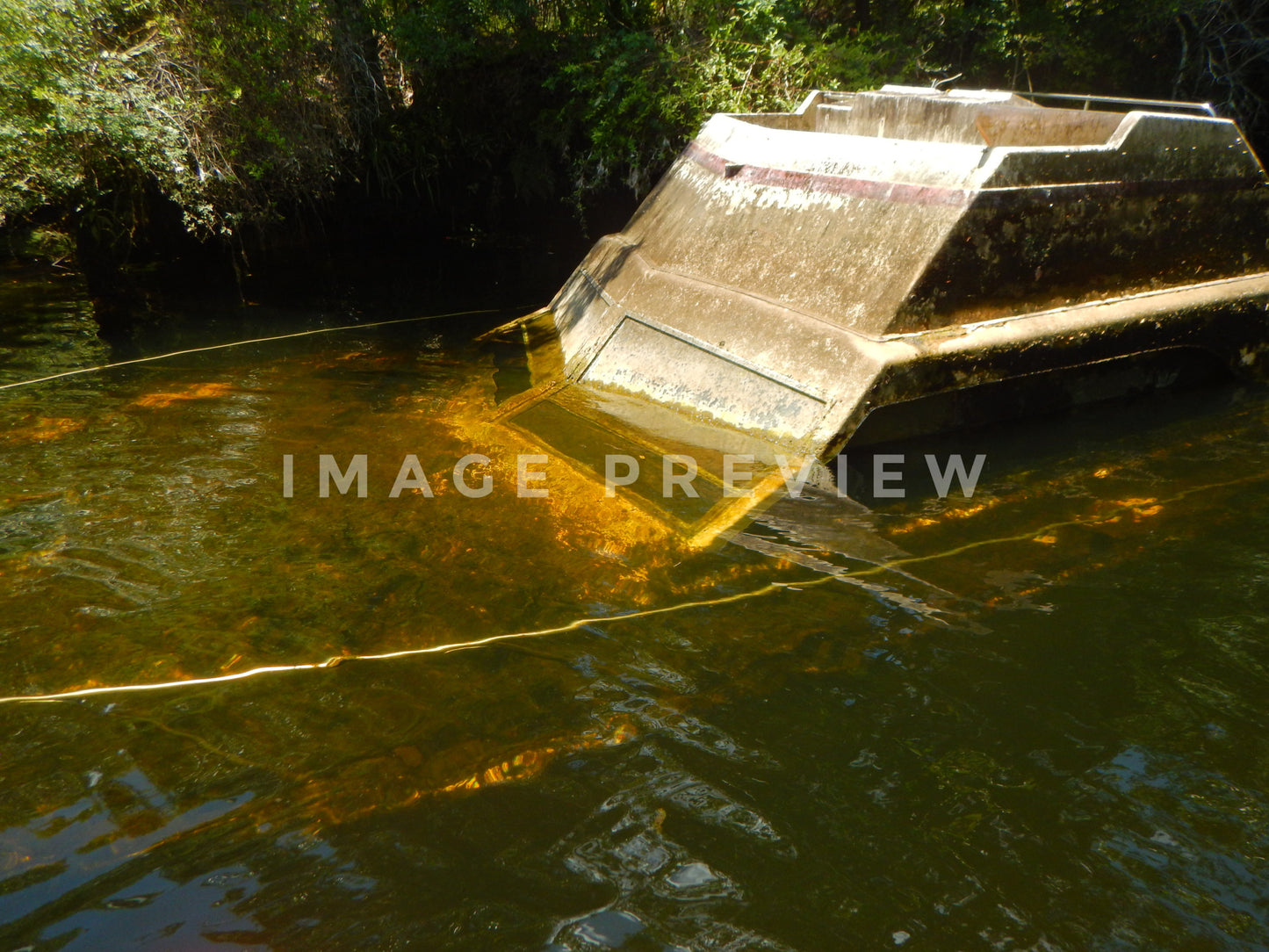 Photo - Wreck of fishing boat resting on bottom of river in Florida