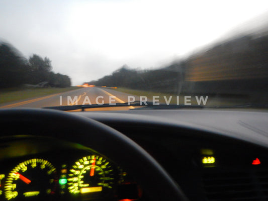 Photo - Motion blur of driving down highway from inside car