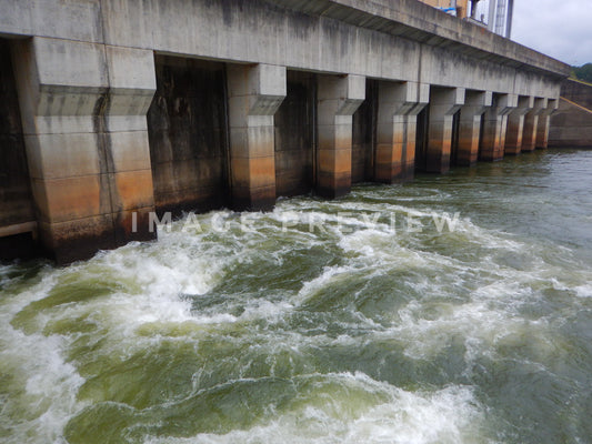 Photo - Lake water rises to surface after passing under Dam