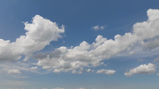 Video - Timelapse - Clouds passing in blue sky