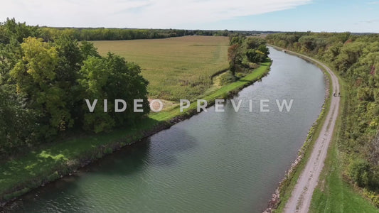 Video - People riding bikes on tow path trail beside Erie Canal