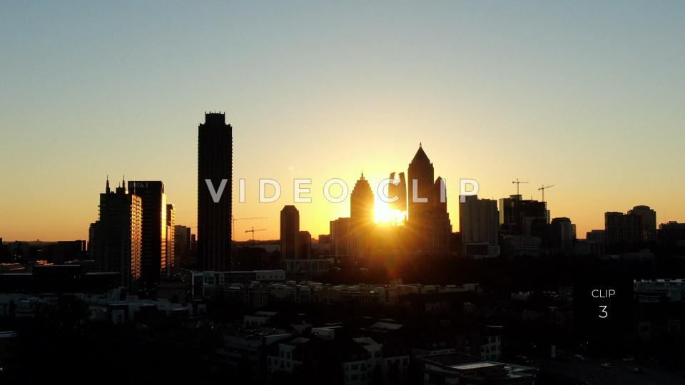 CLIP 3 - Atlanta, GA early morning sun shining behind office towers in downtown