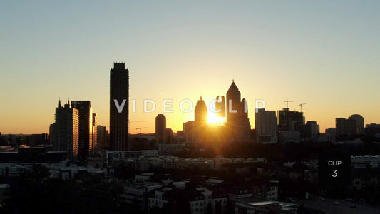 CLIP 3 - Atlanta, GA early morning sun shining behind office towers in downtown