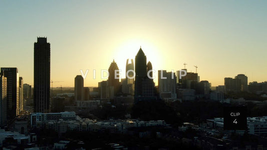 CLIP 4 - Atlanta, GA day begins in downtown with sun behind office buildings