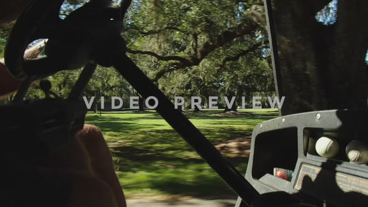 Video - Golf Course country club riding in cart past oak trees