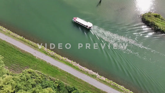 Video - Downward aerial of tour boat cruising on Erie Canal