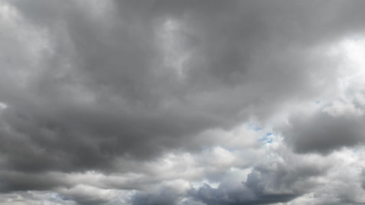 Video - Timelapse - Rain clouds passing overhead with stormy weather approaching