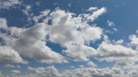 Video - Timelapse - Clouds forming in blue sky