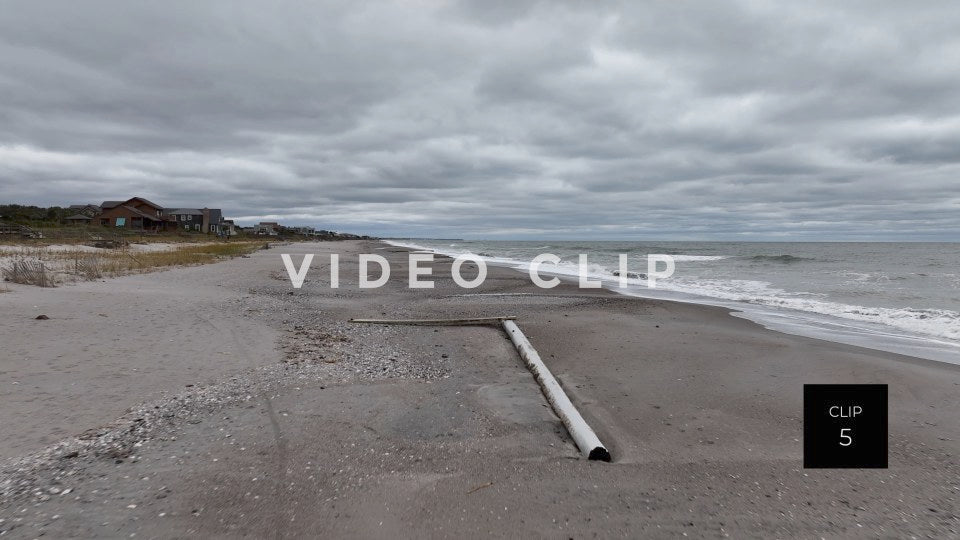 CLIP 5 - Pawleys Island, SC remains of fishing pier washed ashore after Hurricane Ian